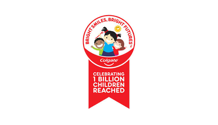 Colgate "Bright Smiles, Bright Futures" logo with a circular illustration of three children smiling, celebrating reaching 1 billion children helped.